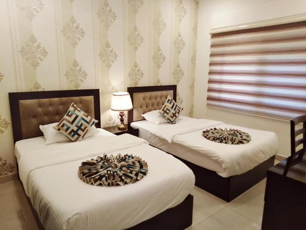 غرف نوم فندق بانوراما عمان
